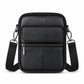 Black pebbled leather crossbody bag with front flap and front zip pocket, wide shoulder strap
