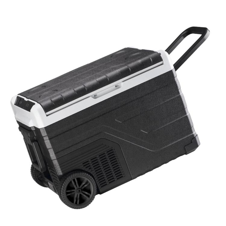 Portable car refrigerator with rolling wheels and telescoping handle, lid closed.