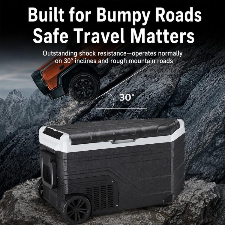 Portable car refrigerator cooler on wheels, rugged design for uneven roads.