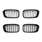 Set of four black oval front grilles with vertical slat bars