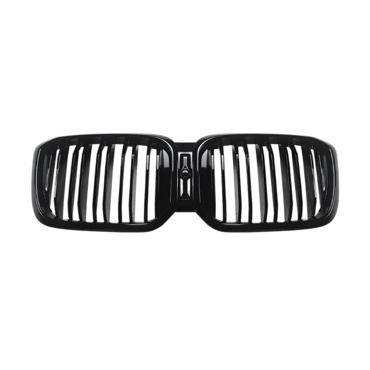 Front air intake grille with black kidney frame and vertical slat design
