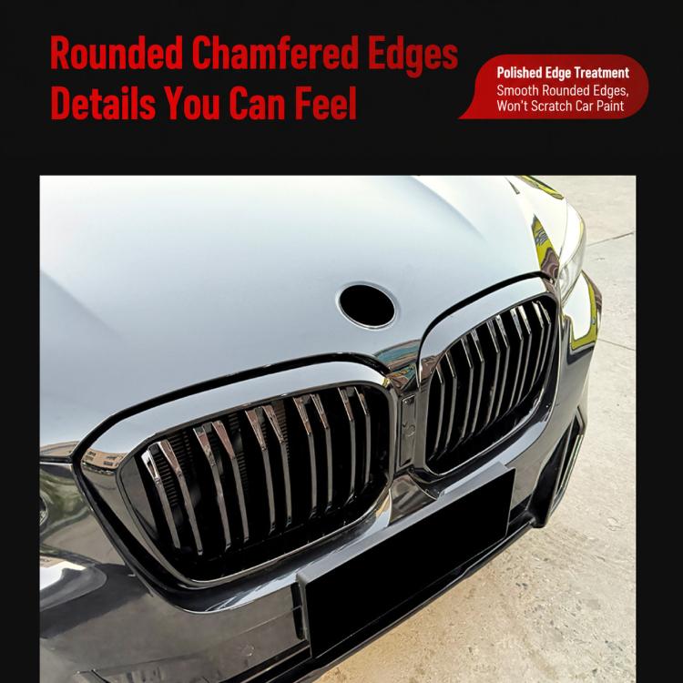 Installed front air intake grille on dark car bumper with vertical slat openings