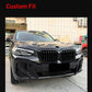 Front air intake grille installed on BMW-style sedan front, black with vertical slats