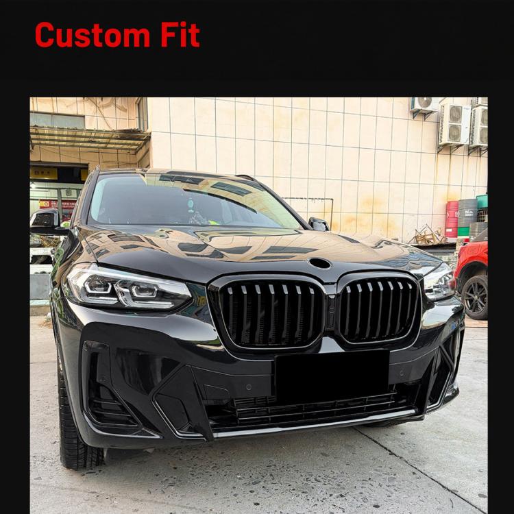 Front air intake grille installed on BMW-style sedan front, black with vertical slats