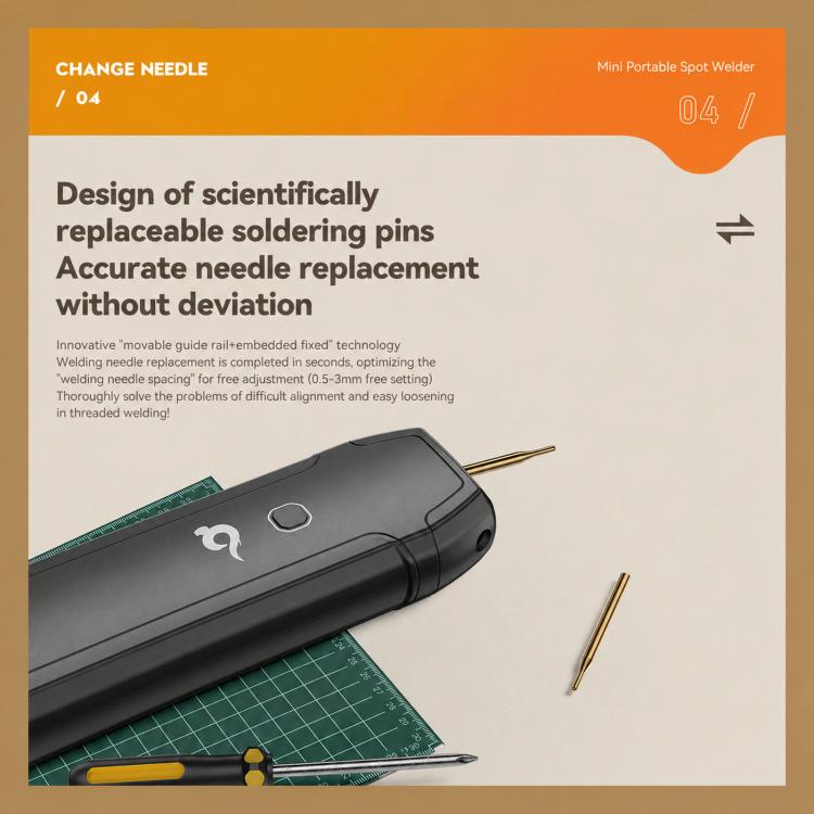 Black spot welder on a work surface with two gold replacement welding needles