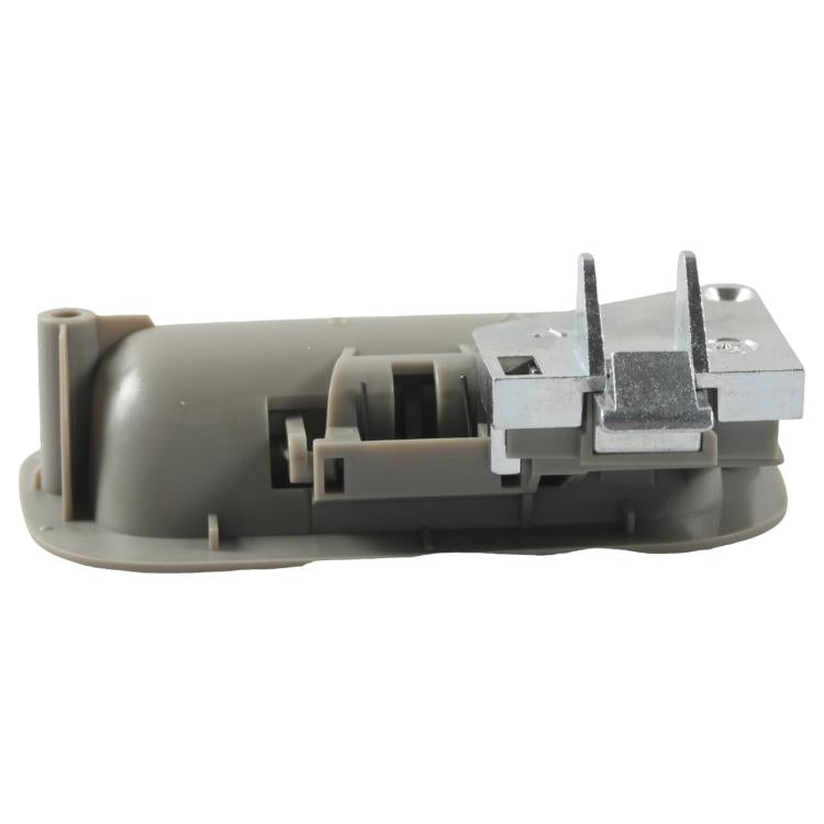 Light gray interior door handle with internal mechanism and spring
