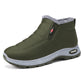 Olive slip-on snow boot with fuzzy trim and thick tread sole for winter walking