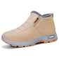 Warm fleece-lined winter slip-on snow boot, tan upper, grippy tread sole