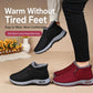 Black and red fleece-lined slip-on winter boots with grippy soles worn by model