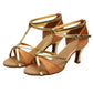 Tan and gold strappy ballroom dance sandals with mid heel and ankle buckle closure.
