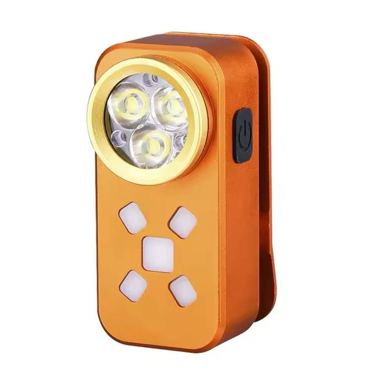 Orange clip-on LED work light with four-point pattern and round headlamp bezel