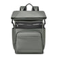 Green laptop backpack with top handle and front zip compartments