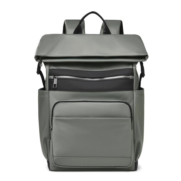 Green laptop backpack with top handle and front zip compartments