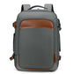 Gray expandable travel backpack with front pocket and top handle, brown trim