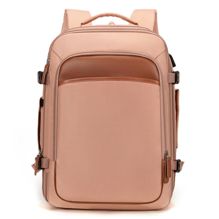 Pink expandable travel backpack with front pocket and top handle, brown trim