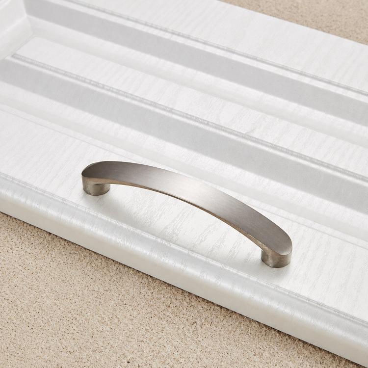 Brushed metal cabinet drawer pull handle with curved bar and rounded end caps