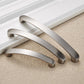 Brushed metal cabinet drawer pulls shown as multiple curved handles with end caps