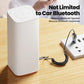 Bluetooth AUX adapter cable with 3.5mm plug connected to a small white speaker