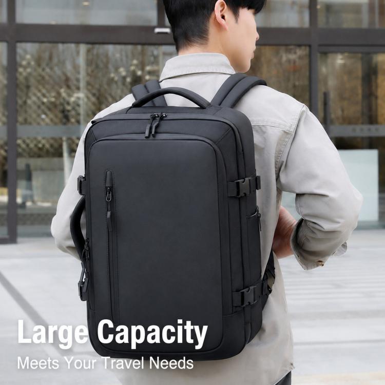 Black backpack worn on back with front buckle straps and structured side panels
