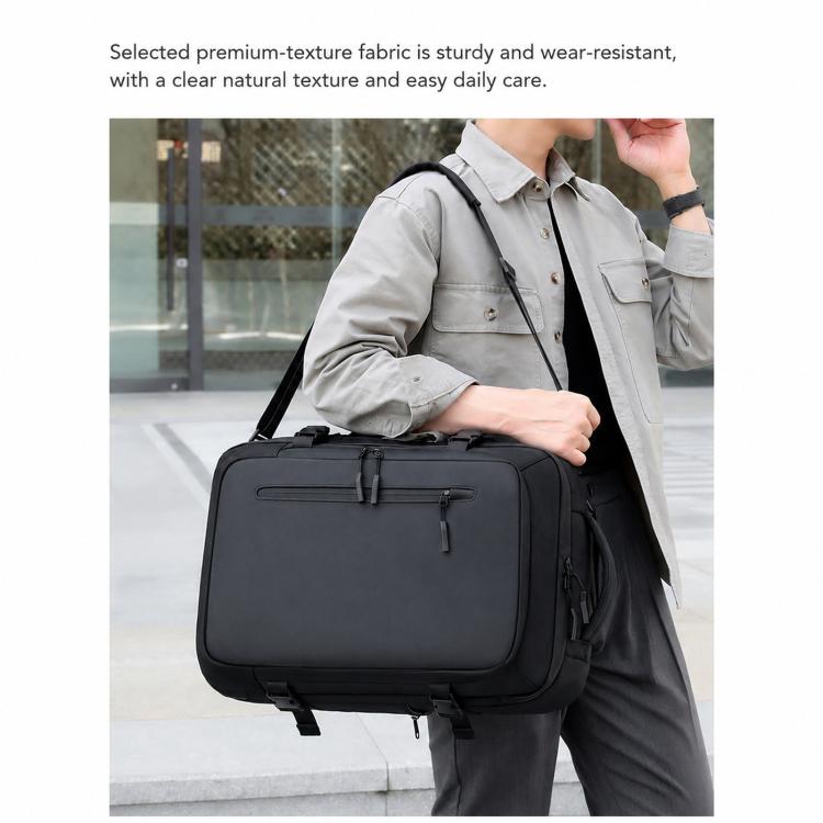 Black laptop backpack with front zipper compartment and adjustable strap webbing