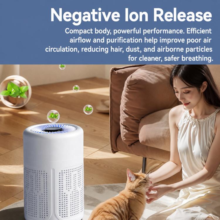 White cylindrical air purifier on the floor with top vent and spinning fan