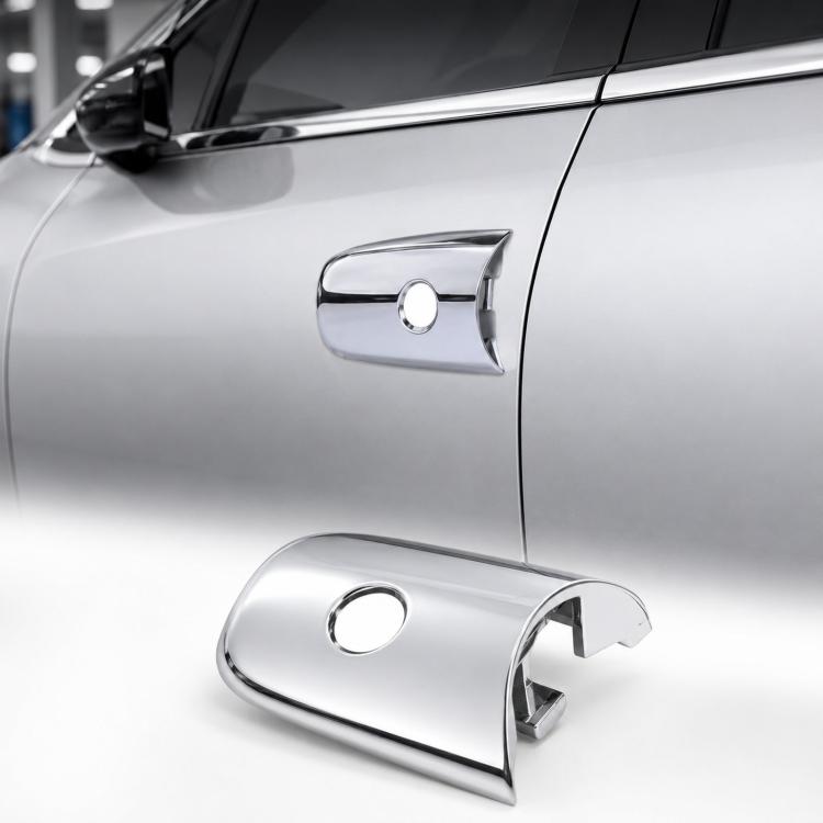 Chrome front door handle cap cover for left driver side exterior, close-up on car door