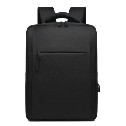 Black laptop backpack with top handle, front zipper pocket, and padded shoulder straps