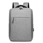Gray laptop backpack with top handle, front zipper pocket, and padded shoulder straps