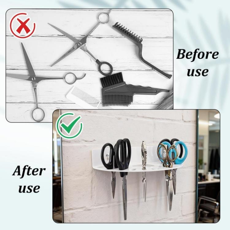 White acrylic wall-mounted scissor holder with attached scissors, combs, and clips