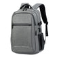 Gray laptop backpack with front zip pocket and padded shoulder straps