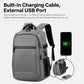 Gray laptop backpack with external USB charging port and built-in cable