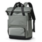 Green laptop backpack with padded front pocket and top carry handle