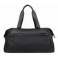 Black water-resistant sports gym bag with top handles and zip front pocket