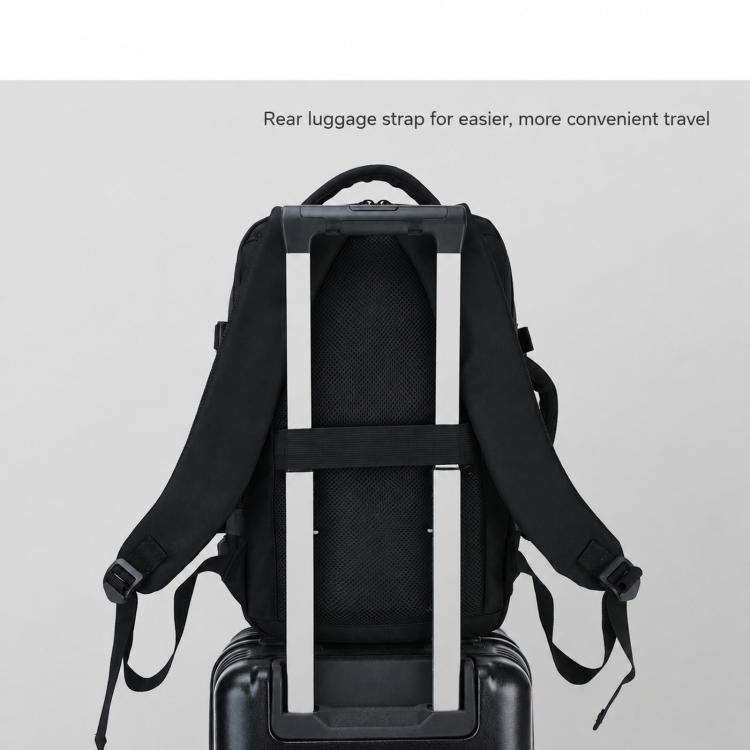 Black rear luggage strap backpack with reinforced handle and carry straps.