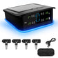 Solar TPMS display unit with LCD readout, blue base glow, and four sensor valves