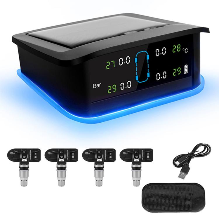 Solar TPMS display unit with LCD readout, blue base glow, and four sensor valves