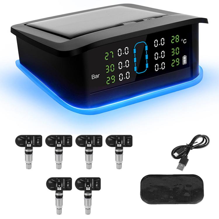 Solar TPMS monitor with LCD screen and blue base, plus external sensor valves and cable