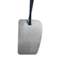 Car paint denibbing blade, rectangular silver metal piece with black hanging cord