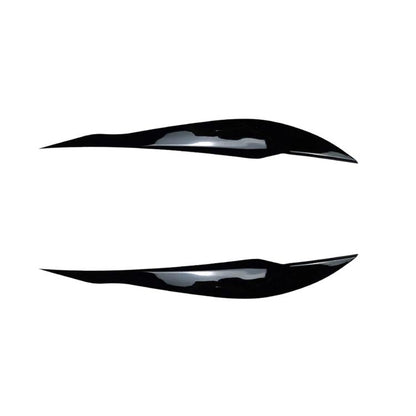 Black headlight eyebrow decal pair with sleek curved design for BMW 3 Series F30/F31