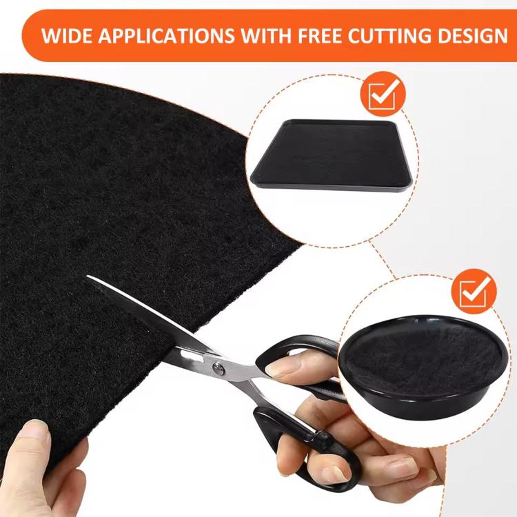 Black splash pad mats with free-cut design, shown with scissors