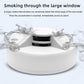 White smoke alarm with vented top, with simulated smoke cloud around it