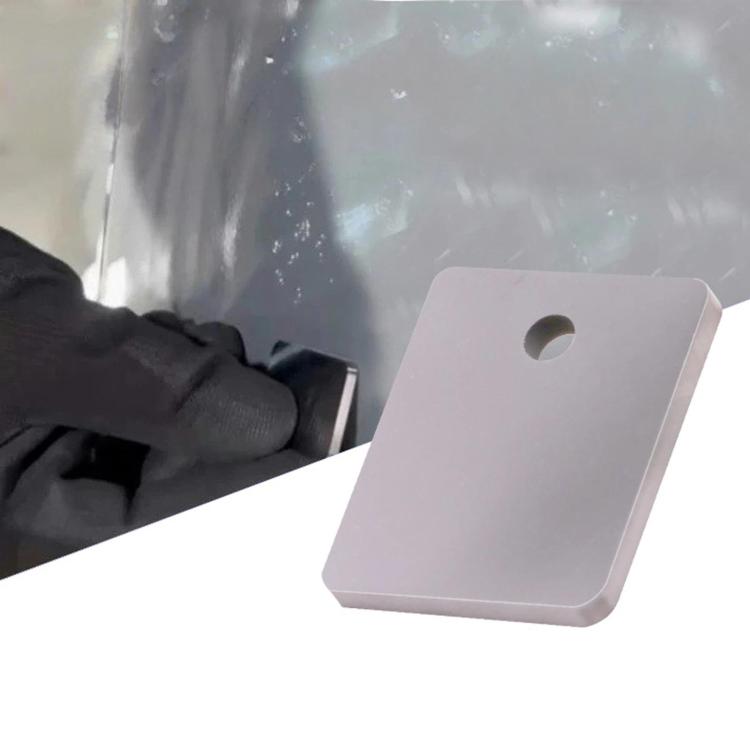 Metal paint scraper tool with hanging loop on light gray card