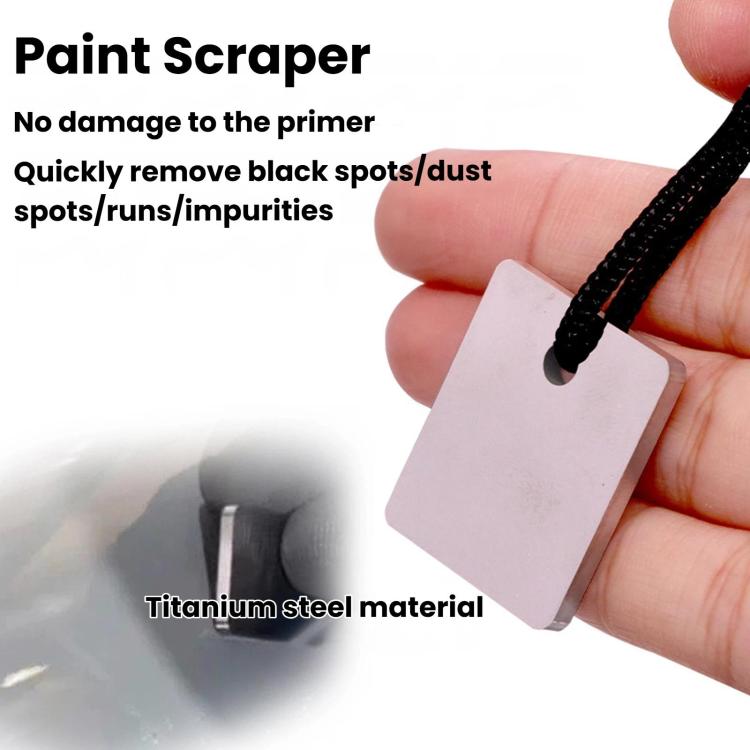 Metal paint scraper tool held in hand with black cord loop