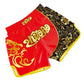 Muay Thai boxing shorts in red and black with gold swirl “2DROP” and floral panel.