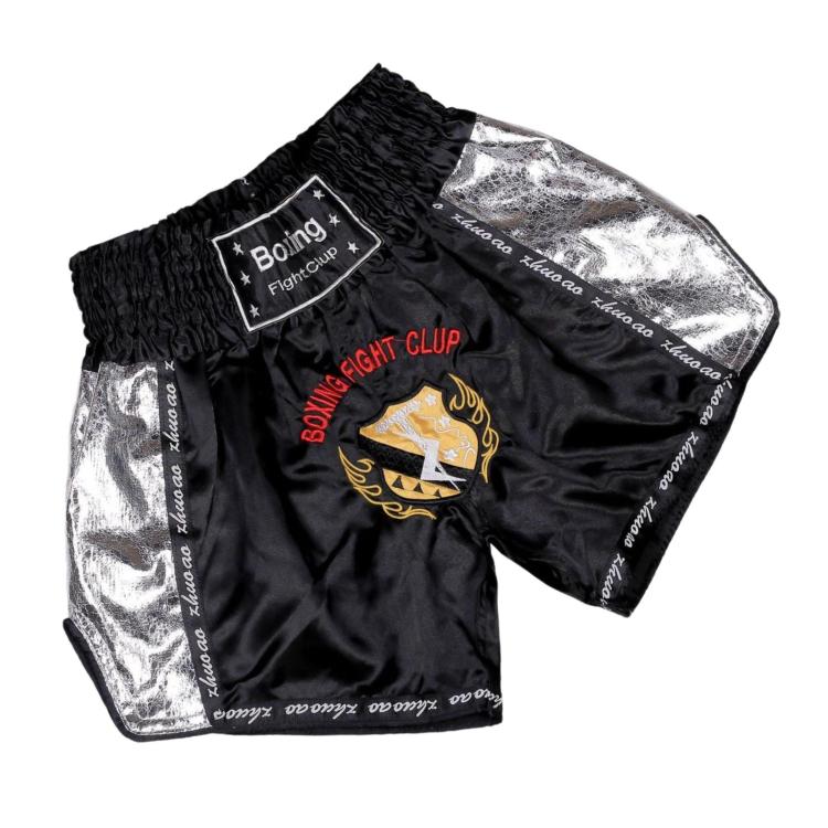 Black boxing shorts with silver side panels, flame emblem, and Fight Club label.