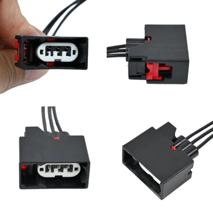 Front turn signal plug pigtail wiring harness showing connector ports and red lock tabs