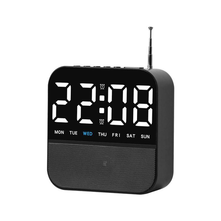 Black digital LED alarm clock radio with white time display and day-of-week lights