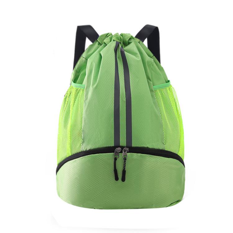 Green drawstring sports backpack with dark stripe and separate lower shoe compartment