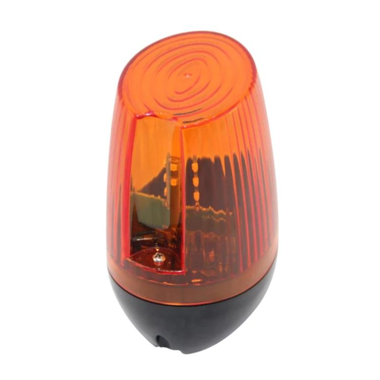 Amber strobe signal light with orange lens dome and black bottom
