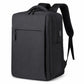 Black waterproof laptop backpack with front pocket and adjustable shoulder strap